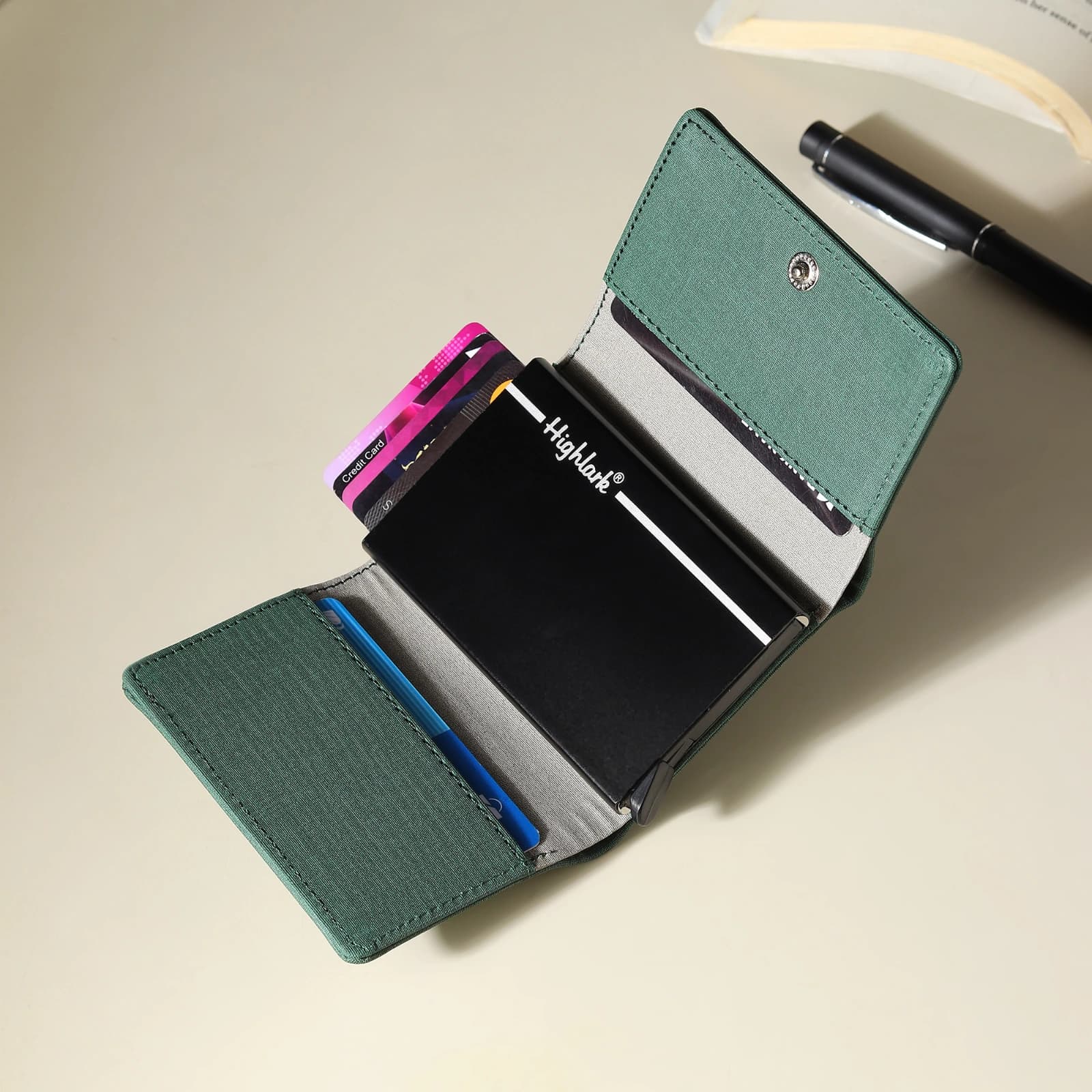 Website Title (H1 / Product Header): Highlark Automatic Pop-Up RFID Blocking Smart Wallet & Card Holder – Sage Green 3