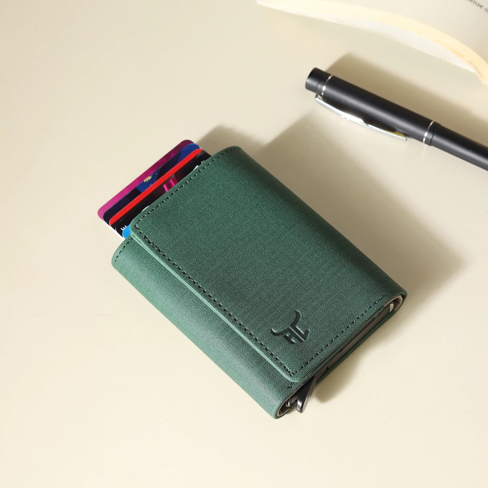 Website Title (H1 / Product Header): Highlark Automatic Pop-Up RFID Blocking Smart Wallet & Card Holder – Sage Green 2